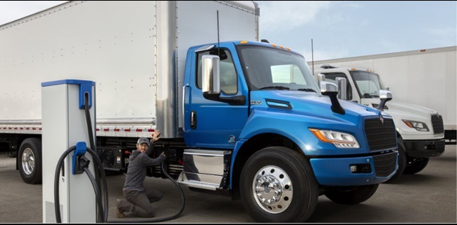 Photo of a blue truck at an  International Trucks charging statoin